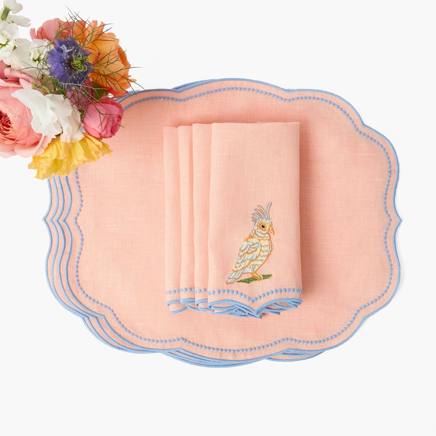 Sets de table et serviettes perroquet en lin corail et bleu Eloise (lot de 4)