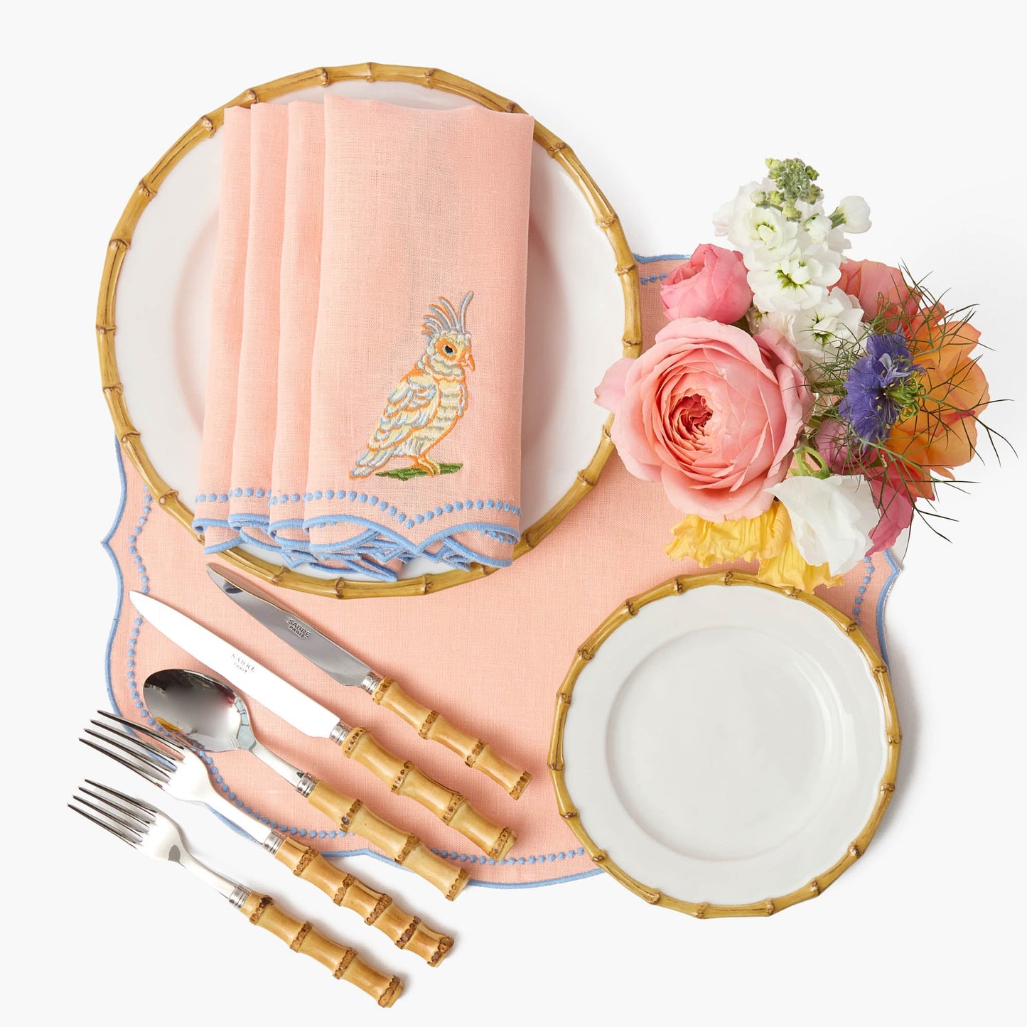 Sets de table et serviettes perroquet en lin corail et bleu Eloise (lot de 4)