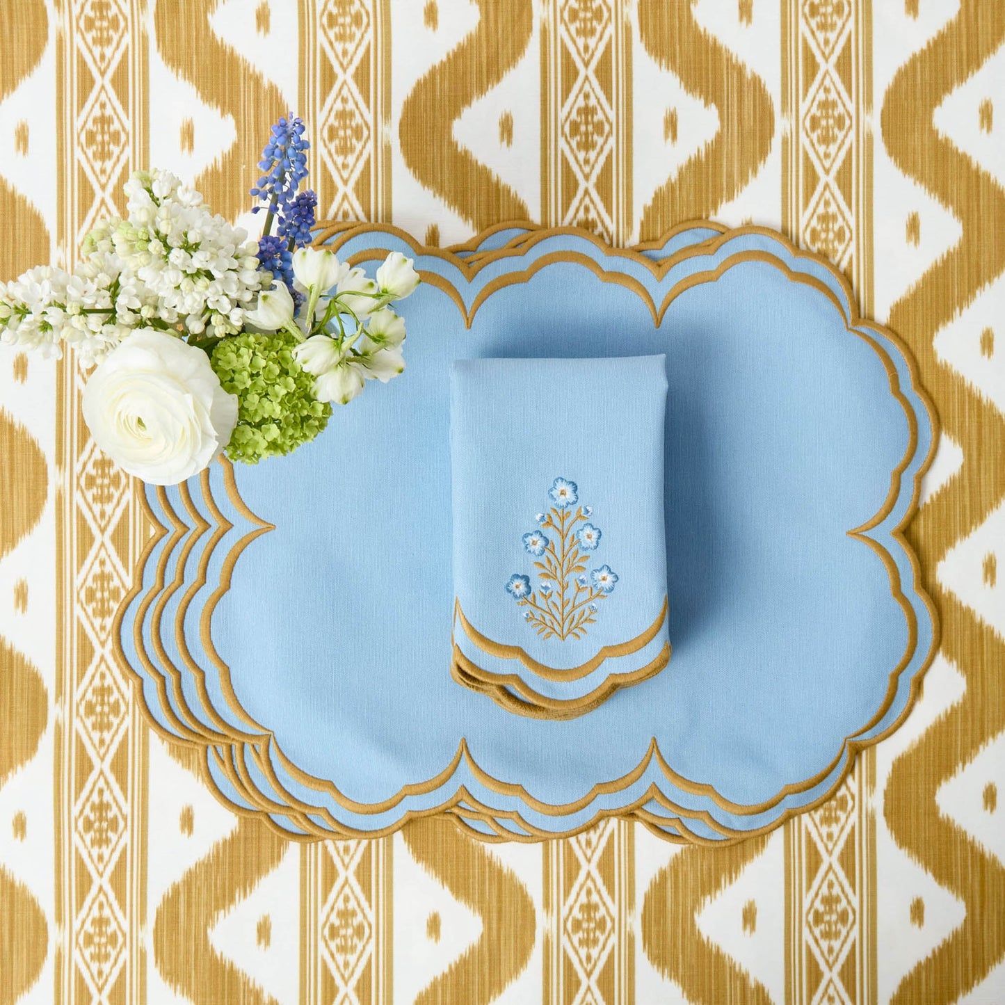 Sets de table et serviettes œillets Serena bleu et caramel (lot de 4)
