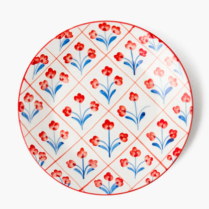 Assiette à dîner à motif treillis floral bleu et rouge