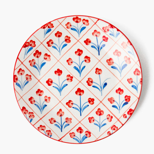 Assiette à dîner à motif treillis floral bleu et rouge
