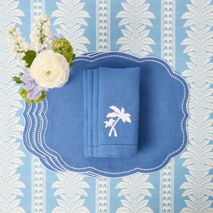 Sets de table et serviettes palmiers en lin bleu Eloise (lot de 4)