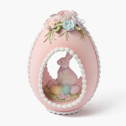 Lapin rose pastel dans un œuf